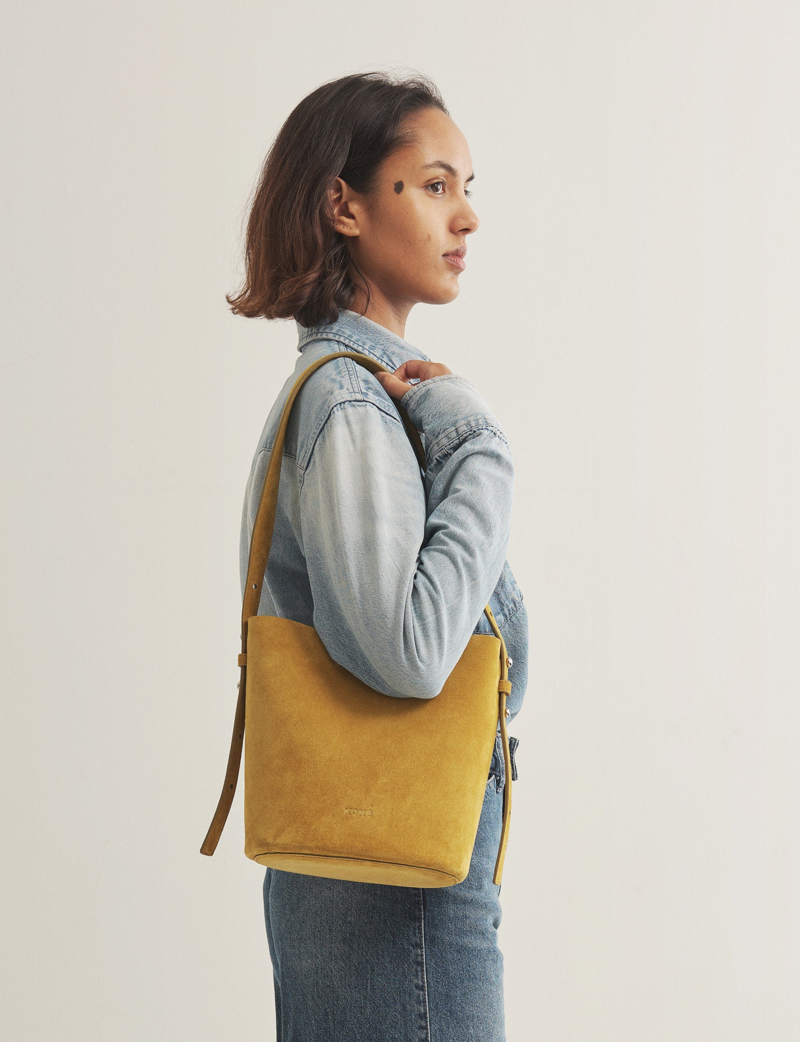 LITTLE LEO BUCKET BAG - OLIVE OIL SUEDE