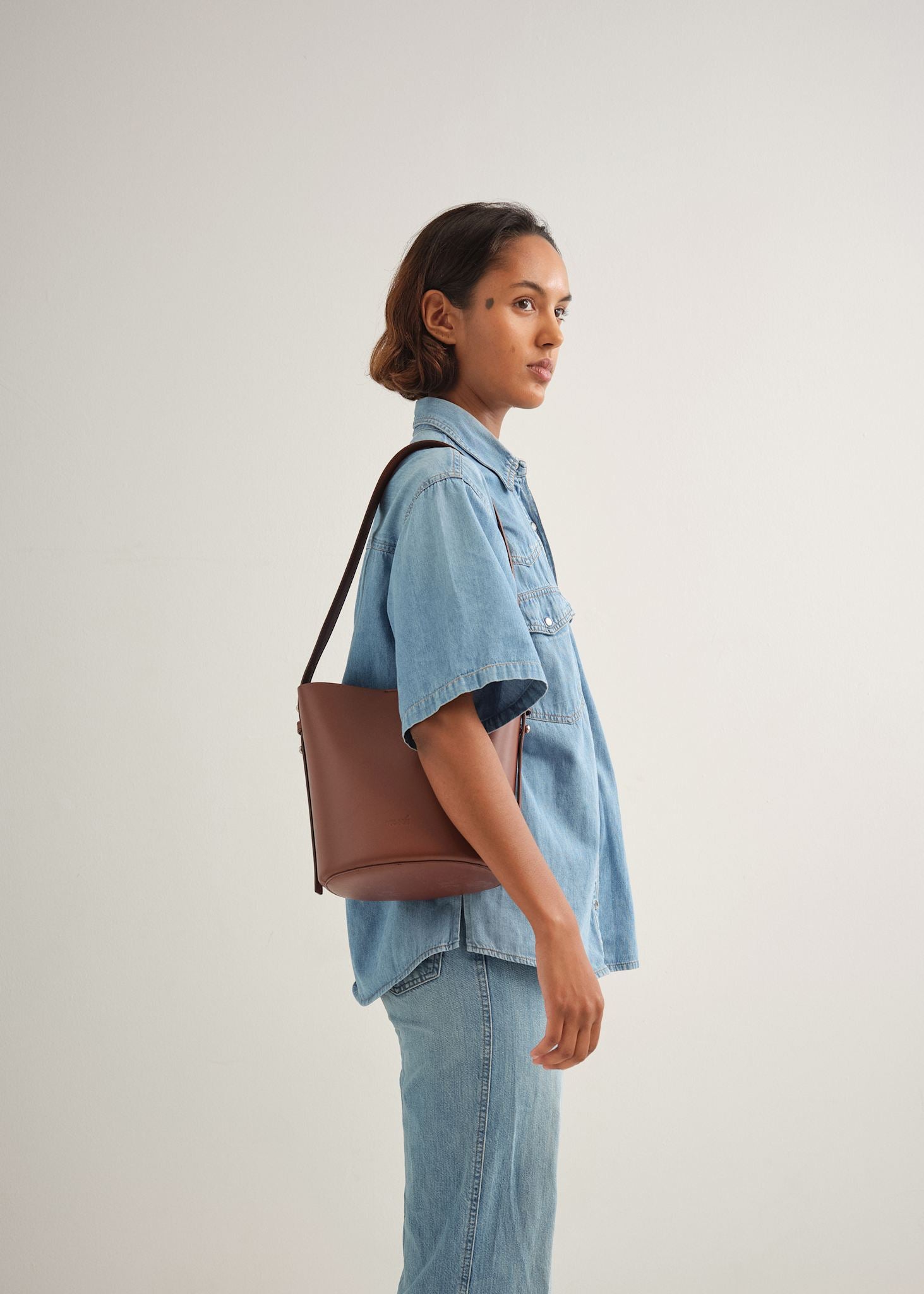 LITTLE LEO BUCKET BAG - RUSTY VITELLO