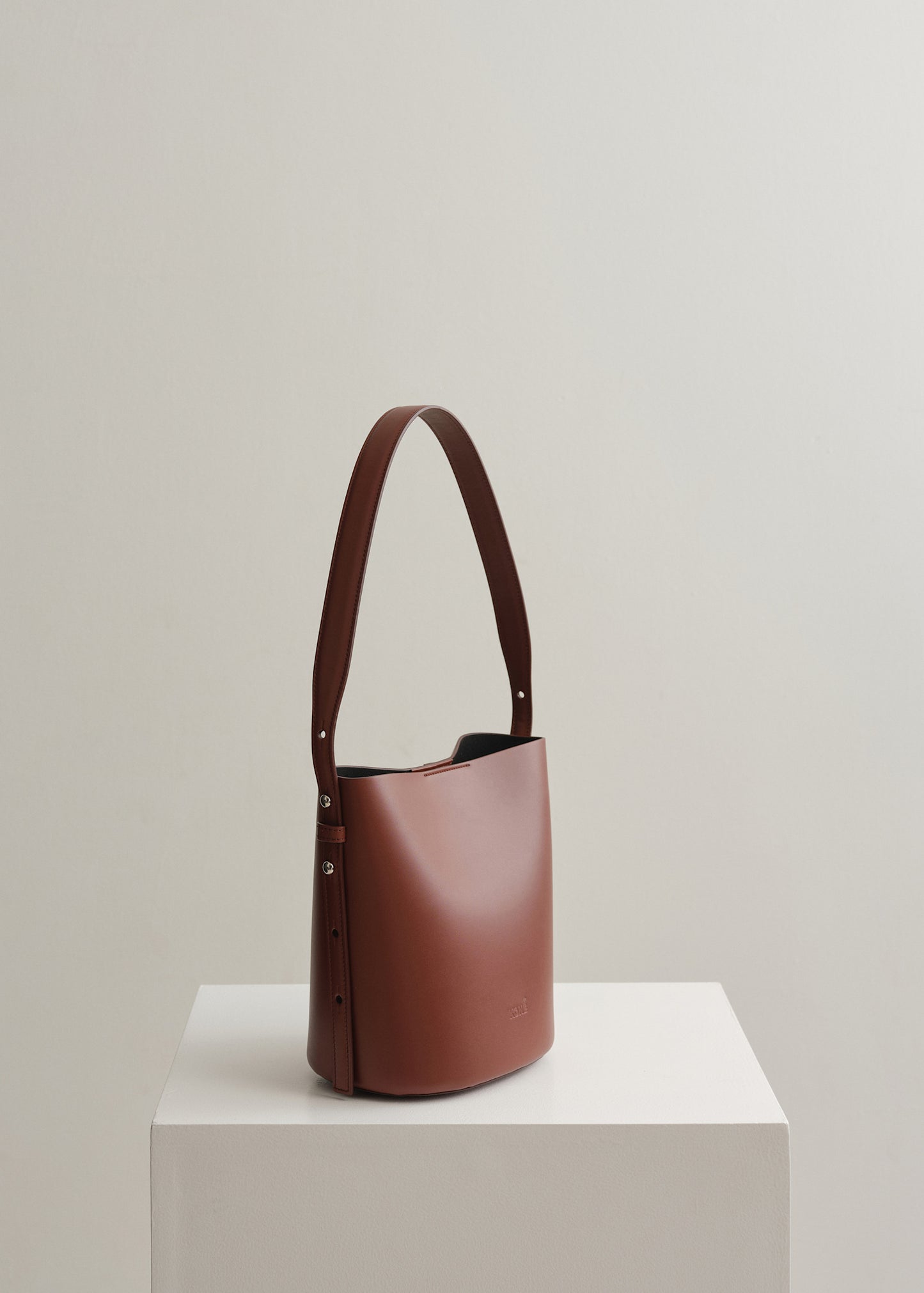 LITTLE LEO BUCKET BAG - RUSTY VITELLO